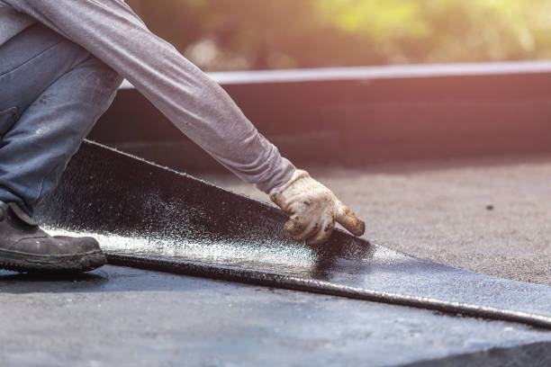 Professional Basement Waterproofing technician working in Farmersville, OH